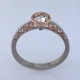 Blending old world charm with contemporary style, this diamond engagement ring brings grace and elegance to the wearer. Hand crafted in 18 karat white and rose gold, with .01ct. total weight of diamonds adding a little extra sparkle. And to top this elegant ring off, a .59ct. European cut round light champagne natural color diamond.

Designed by the acclaimed artist Alishan in his California studio.  All designs can be made any way you like, with any gemstones you like.