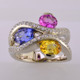 You will feel special with this very special gemstone ring on your finger. This unique, custom designed diamond and natural color sapphire ring has a display of color to rival nature! Yummy Blue, Yellow, and Pink oval, natural color sapphires, intertwined with .45 carat total weight of sparkling ideal cut diamonds. All meticulously set in 14 karat white gold. This diamond and sapphire gemstone ring will warm your heart, and make you smile every day! :) The finger size is 7, and can be sized up or down about 2 two sizes, plus or minus. 
This is a special, one of a kind piece.

Designed and created in our studio by the artist Stuart J.