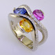 You will feel special with this very special gemstone ring on your finger. This unique, custom designed diamond and natural color sapphire ring has a display of color to rival nature! Yummy Blue, Yellow, and Pink oval, natural color sapphires, intertwined with .45 carat total weight of sparkling ideal cut diamonds. All meticulously set in 14 karat white gold. This diamond and sapphire gemstone ring will warm your heart, and make you smile every day! :) The finger size is 7, and can be sized up or down about 2 two sizes, plus or minus. 
This is a special, one of a kind piece.

Designed and created in our studio by the artist Stuart J.