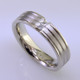 Modern mans diamond wedding ring - classy and very cool. Crafted in 14 karat white gold, it's 6mm wide, with three continuous grooved lines, featuring two princess cut diamonds totaling one tenth carat. This ring has a rounded shape and comfort fit inside to make this ring the most comfortable it can be. Finger size is 11, and it can be sized, or custom made Just For You.

This diamond wedding ring is priced in 14k gold, and can be made in any karat or color of gold, and in platinum. Please allow 2 weeks for us to make it. It will be worth it!

Designed, and created in our studio by the artist Stuart J.