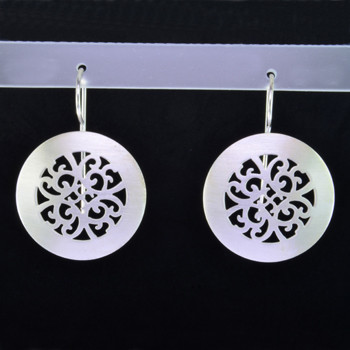 These round,oriental filagree design Sterling Silver earrings will make you shine in any outfit. Wear them with your jeans or for an evening out. With Sterling Silver ear wires. Measure 1 3/16 inches.

Handmade in Istanbul, Turkey.