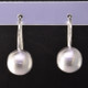 Fun for everyday, these earrings will be your go-to accessory. Modern balls in Sterling Silver, dangling from wires. Measure 3/4 inch long.

Handmade in Istanbul, Turkey.
