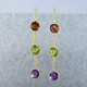 Fun dangles you can wear day or night. 14 karat yellow gold 3 stone dangle with amethyst, peridot, and garnet gemstones set delicately in simple bezels and hanging on wires. Measure 2 inches long. 