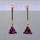 Fun and modern, these earrings dazzle for day or night. Hand crafted in 14 karat yellow gold with sparkling 6mm rhodolite garnet trillian gemstones and .10ct. of ideal cut diamonds hanging on posts.. Earrings measure 1" long.
Designed, and created in our studio by the artist Stuart J. Fun and modern, these earrings dazzle for day or night. Hand crafted in 14 karat yellow gold with sparkling 6mm rhodolite garnet trillian gemstones and .10ct. of ideal cut diamonds hanging on posts.. Earrings measure 1" long.
Designed, and created in our studio by the artist Stuart J.