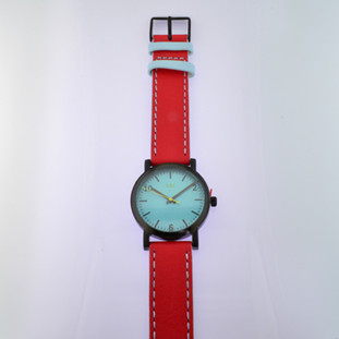  Here is time in full color. This Taki watch is fun, fun, fun! Fresh design, fresh color palette, all leather strap, a Japanese movement, and stainless steel bezels. Face measures 1 1/4 inches.  Clean simple designs with so many fun colors, it will make you happy every time you wear it. And at a very affordable price