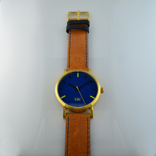   Here is time in full color. This Taki watch is fun, fun, fun! Fresh design, fresh color palette, all leather strap, a Japanese movement, and stainless steel bezels. Face measures 1 3/4 inches.  Clean simple designs with so many fun colors, it will make you happy every time you wear it. And at a very affordable price