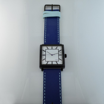   Here is time in full color. This Taki watch is fun, fun, fun! Fresh design, fresh color palette, all leather strap, a Japanese movement, and stainless steel bezels. Face measures 1 1/2inch square. Clean simple designs with so many fun colors, it will make you happy every time you wear it. And at a very affordable price