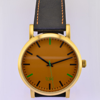Here is time in full color. This Taki watch is fun, fun, fun! Fresh design, fresh color palette, all leather strap, a Japanese movement, and stainless steel bezels. Face measures 1 3/4 inches.  Clean simple designs with so many fun colors, it will make you happy every time you wear it. And at a very affordable price