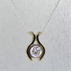 Sweet, simple, modern tulip diamond solitare pendant. Wear it for work or play. Crafted in 14 karat white Gold with .71ct. diamond center, hanging on a 14 karat white gold cable chain in 18". Measure 1/2 inch long.

Designed, and created in our studio by the artist Stuart J.