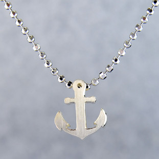 What's your story? Begin with this Little Anchor, solid Sterling Silver pendant. Wear it alone, with other pendants, or layered with other necklaces. Comes with a sterling silver ball chain, 16 inches long. The pendant measures 1/4 inch long. Too cute!

Signified by a feminine sensibility and optimistic charm, Alex Woo's Little Icon Collections reinvent familiar symbols from the world around us into fresh and expressive designs.

Designed and handcrafted by Alex Woo in New York City.
