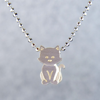 What's your story? Begin with this Little Kitten, solid Sterling Silver pendant. Wear it alone, with other pendants, or layered with other necklaces. Comes with a sterling silver ball chain, 16 inches long. The pendant measures 1/4 inch long. Too cute!

Signified by a feminine sensibility and optimistic charm, Alex Woo's Little Icon Collections reinvent familiar symbols from the world around us into fresh and expressive designs.

Designed and handcrafted by Alex Woo in New York City.