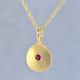 This sweet gemstone pendant shimmers as you wear it. Beautiful in 14 Karat yellow gold, this medallion has a rich deep red ruby gemstone in the center, and hangs on a 1 mm 14 karat yellow gold rope chain,18 inches long.Pendant measures 3/4 inch long. Available in other colors. Please call for pricing.
Designed & Created in our studio by the artist Stuart J. This sweet gemstone pendant shimmers as you wear it. Beautiful in 14 Karat yellow gold, this medallion has a rich deep red ruby gemstone in the center, and hangs on a 1 mm 14 karat yellow gold rope chain,18 inches long.Pendant measures 3/4 inch long. Available in other colors. Please call for pricing.
Designed & Created in our studio by the artist Stuart J.