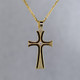 A perfect gift for any occasion, this elegant and modern 14 Karat yellow gold cross pendant features a beautiful .015ct. ideal cut diamond in the center, and suspended on a 0.7mm 14 karat yellow gold foxtail chain, 18 inches long. This beautiful cross pendant measures 1 inch tall, by 1/2 inch wide. 

Designed and created in our studio by the artist Stuart J.