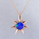 This beautiful pendant twinkles just like the stars at night. Our Starflake(tm) andamooka opal and Diamond pendant is made in 14 karat rose Gold, set with a mesmerizing 8mm blue round opal , surrounded by .28ct. T.W. Ideal cut Diamonds. Includes a 14 karat rose Gold foxtail chain, 18 inches long. Pendant measures 1 inch long.

Designed, and created in our studio by the artist Stuart J.