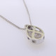 You will feel captivated by the feel of modern and vintage in this elegant diamond pendant. 14 karat white gold with .16 carats of sparkling ideal cut diamonds. This beautiful diamond pendant measures 1/2 inch long, and dangles on a 14 karat white gold 1.1mm wheat chain, 18" long.

Designed and created in our studio by the artist Stuart J.