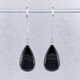Beautiful Australian Black Jade drop dangle earrings.  We chose these stones for the amazing shiny black color, and that they are known to protect the wearer.  We created these dazzling one of a kind earrings in 14 Karat white gold, added .35ct. of ideal cut diamonds on top, and dangled the Black Jade Pear Shapes on the bottom.  These earrings are simply spectacular!  Hangs on diamond wires, and measures 1 3/4" long.

Designed, and created in our studio by the artist Stuart J.