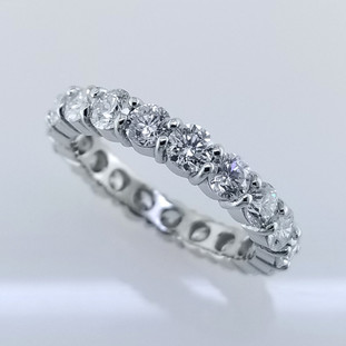 This diamond anniversary ring will never go out of style. Our philosophy is to make jewelry that lasts forever and that you can wear day or night. (Or day AND night). We created this diamond ring in 14 karat White gold, with nearly four and a half carats of super sparkly Ideal cut diamonds. Simply stunning on your finger. Diamonds really are a girls best friend!!!!

This custom designed diamond anniversary ring is individually crafted, to be Perfectly You, and takes about 2-3 weeks to create. Please call us for more information about how we can customize this design Just For You. 

Designed and created in our studio, by the artist Stuart J. Adelman.