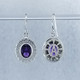 We created these timeless Amethyst and diamond halo earrings with a modern flare. There are no prongs to worry about, and our special setting style makes the 3/4 carat of super sparkly, Ideal cut diamonds look like twice the amount. Handmade in 14 karat White gold, two 9mm by 7mm oval, bezel set, deep purple amethysts create enough drama for evening, but not too much for every day wear. Dangling on handmade white gold wires, they measure about 1" long, and are designed and handcrafted by the artist, Stuart J. Adelman.
Call us for more information about how we can customize this design Just For You. We created these timeless Amethyst and diamond halo earrings with a modern flare. There are no prongs to worry about, and our special setting style makes the 3/4 carat of super sparkly, Ideal cut diamonds look like twice the amount. Handmade in 14 karat White gold, two 9mm by 7mm oval, bezel set, deep purple amethysts create enough drama for evening, but not too much for every day wear. Dangling on handmade white gold wires, they measure about 1" long, and are designed and handcrafted by the artist, Stuart J. Adelman.
Call us for more information about how we can customize this design Just For You.