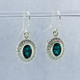 We created these timeless Emerald and diamond halo earrings with a modern flare. There are no prongs to worry about, and our special setting style makes the 1/3 carat of super sparkly, Ideal cut diamonds look like twice the amount. Handmade in 14 karat Green gold, two 7x5 oval, bezel set, deep green created emeralds create enough drama for evening, but not too much for every day wear. Dangling on handmade white gold wires, they measure about 1/2" long, and are designed and handcrafted by the artist, Stuart J. Adelman.
Call us for more information about how we can customize this design Just For You. We created these timeless Emerald and diamond halo earrings with a modern flare. There are no prongs to worry about, and our special setting style makes the 1/3 carat of super sparkly, Ideal cut diamonds look like twice the amount. Handmade in 14 karat Green gold, two 7x5 oval, bezel set, deep green created emeralds create enough drama for evening, but not too much for every day wear. Dangling on handmade white gold wires, they measure about 1/2" long, and are designed and handcrafted by the artist, Stuart J. Adelman.
Call us for more information about how we can customize this design Just For You.