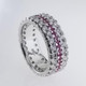 This timeless and classic anniversary band is a must for that special occasion. Created in 14 Karat white gold, setting 2 rows of 1.82ct. of Lab Grown sparkly diamonds, and a single middle row of beautiful bright pink sapphires .45ct. This ring measures 1/4 inches and is ready in a size 6 1/2.  We can custom make any finger size for you, but depending on the size, there will be a price adjustment. Please call us with finger size, and we will give you an updated price.

Custom designed and handcrafted in our studio, by the artist Stuart J.
