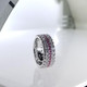 This timeless and classic anniversary band is a must for that special occasion. Created in 14 Karat white gold, setting 2 rows of 1.82ct. of Lab Grown sparkly diamonds, and a single middle row of beautiful bright pink sapphires .45ct. This ring measures 1/4 inches and is ready in a size 6 1/2.  We can custom make any finger size for you, but depending on the size, there will be a price adjustment. Please call us with finger size, and we will give you an updated price.

Custom designed and handcrafted in our studio, by the artist Stuart J.