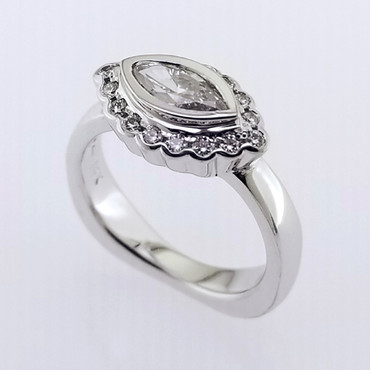  WED-405
She needed an update on her original diamond engagement ring.  We made it good again!