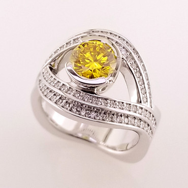 Wed- 401-  Custom designed ring for our customer's 30th anniversary using this 1ct. round created yellow diamond, and many sparkly diamonds.  Beautiful!