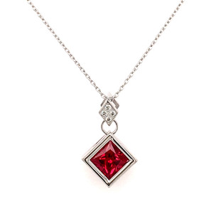 This captivating dangly pendant will take her breath away! Modern and elegant, handmade in 14 karat white gold, set with .04ct. T.W. of our super sparkly ideal cut diamonds, and a spectacular 1.45ct. rich red Chatham(r) created square ruby gemstone. Hangs on a 14 karat white gold, 1mm adjustable round cable chain, 16-18" long.
Designed and created in our studio by the artist, Stuart J.