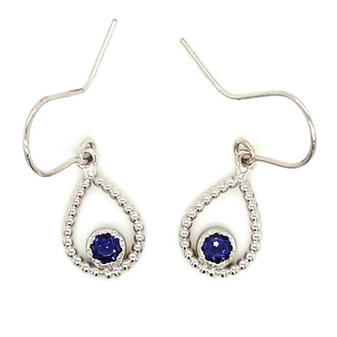 You will be captivated by this mix of modern and vintage in these sweet and sassy dangle earrings. Handmade in 14 karat white gold, with beautiful, iolite gemstones. You will have so much fun wearing them day or night.  Measures 1 inch long and hangs on 14 karat white gold wires. 
Designed and created in our studio by the artist, Stuart J.
We can make these with your favorite gemstones.