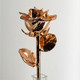 Real semi-opened rose, with petals dipped in rich rose gold lacquer and trimmed in 24kt gold. Stem is approximately 12" long and is heavy gold plated. Each rose is elegantly wrapped in gold tissue and packaged in a gold, two-piece outer box. Price includes the vase, and regular shipping. Available in other colors. Call for color choices.