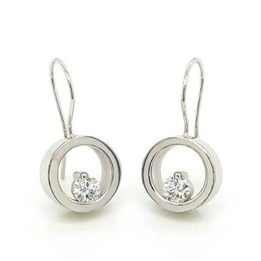 These earrings are truly timeless. Beautiful circles with floating Diamonds at the bottom. 14 karat White Gold, with .50ct T.W. Ideal cut  Diamonds hanging on wires. Measure 1" long.

Designed and handmade by the artist Stuart J.