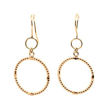 Circles never go out of style, and these dangle circle earrings will not disappoint.  14 karat yellow gold with a little vintage, and a little modern all at the same time. These earrings are the perfect gift, or self purchase. Measure 1" long, and hangs on yellow gold wires. 

Also available in other  metals, but will take 2 weeks for delivery.

Designed, and created in our studio by the artist Stuart J.
