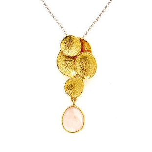 Our organic lily pad pendant in silver gold plated, with a dangling oval rose quartz gemstone. This natural down to earth pendant hangs on a 18" silver wheat chain. Measures 1 3/4 inch long.