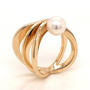 Our stunning open spiral ring, modern but timeless. Created in 14 karat yellow gold, with a 7.5mm fine akoya pearl. This ring says wow! Ring is size 6 1/2.

Created in our studio, by the artist Stuart J.