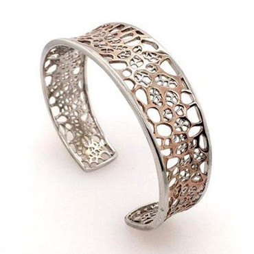 Our silver and rose gold plated cuff with an open weave pattern is fun to wear day or night.  This cuff bracelet measures 3/4 inches at the top, and graduates to 1/4 inches at the bottom. LOVE!