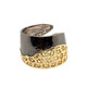 Born in Spain, this fun and flirty filigree ring will make your day! Extends to fit most finger sizes. Measures 1/2" wide. Silver gold plate/ and ruthenium.