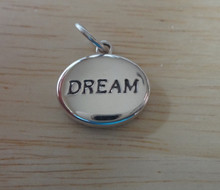 3D Oval Puffy says Dream Sterling Silver charm