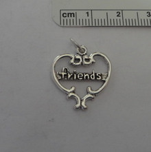 Cut out says Friends Heart Sterling Silver Charm!