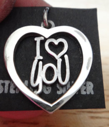 says I Love You in Cut Out Heart Sterling Silver Charm!
