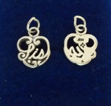 Small Cut-out says Sis on Heart Sister Sterling Silver Charm!