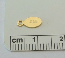 Tiny Gold Plated Sterling Silver Finding Oval Tag says 925