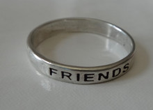 sizes 5 to 10 says Friends Forever Sterling Silver Ring