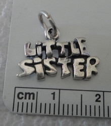 says Little Sister Sterling Silver Charm