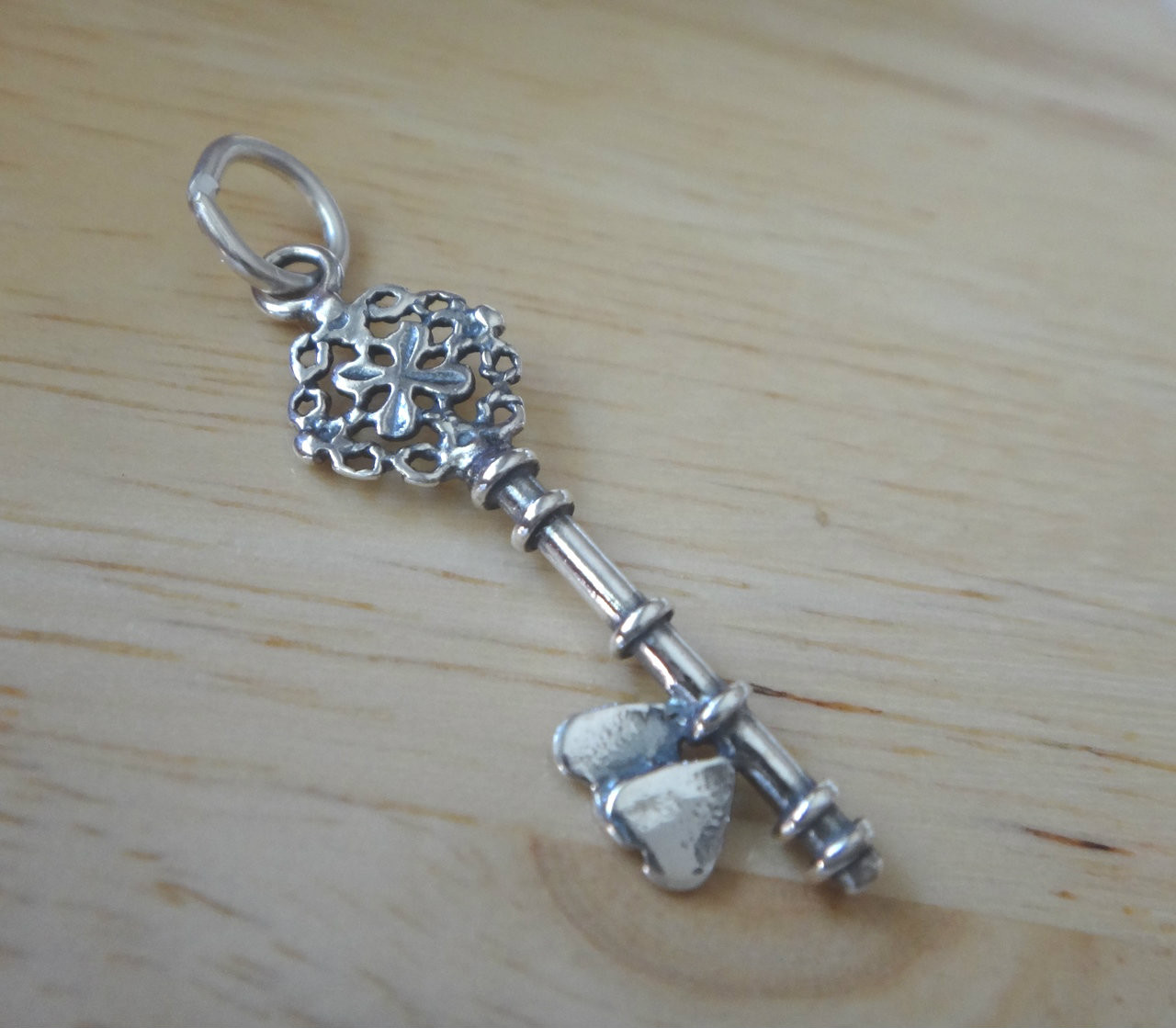 STERLING SILVER MARTIAL ARTS INSTRUCTOR CHARM WITH ONE SPLIT RING