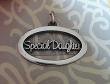24x16mm Cut Out Oval says Special Daughter Sterling Silver Charm