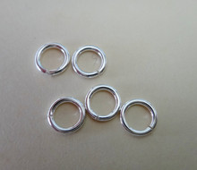 Five 6mm 18 Gauge Sterling Silver Jump Rings to add charms to a Bracelet or Chain