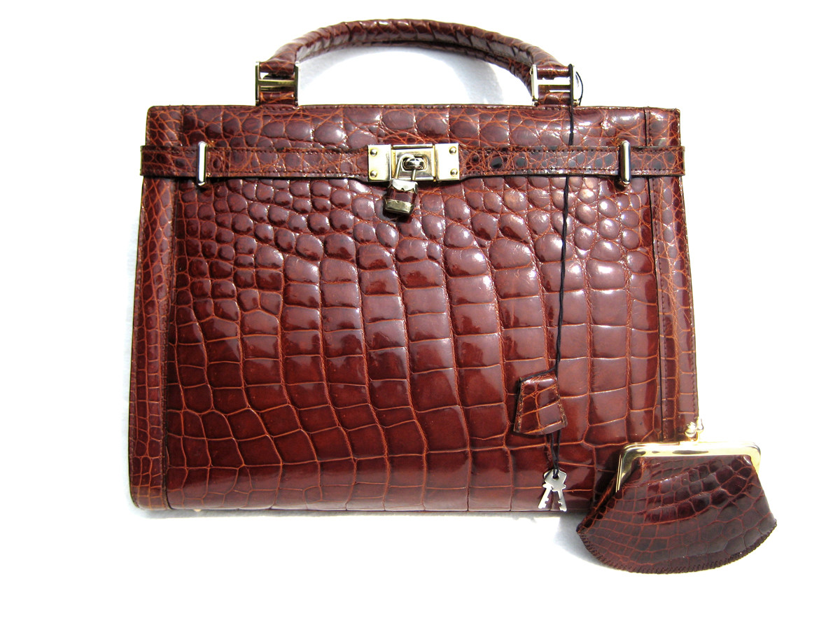 GIEVA - H.J. Cave made the first luxury leather handbag. small and