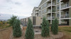 48 unit apartment building installation in Wolfville, Nova Scotia featuring six 10 ton outdoor heat pumps connected to three 20 ton tandem DX2W-3 modules inside .