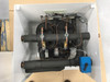 This is the view from the top removable panel showing the mixing valve assembly over the heat exchangers.