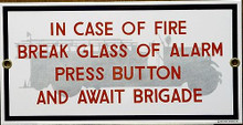 Photo of FIRE BRIGADE PORCELAIN SIGN,  IN CASE OF FIRE BREAK ALARM GLASS, PUSH BUTTON AND AWAIT FIRE BRIGADE SIGN HAS SHARP COLORS AND DETAIL THIS SIGN IS OUT OF PRINT, WE HAVE ONLY ONE LEFT
